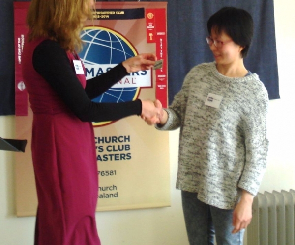 Suet Peng receiving her Competent Communicator ‘pin’